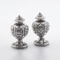 A pair of Indian Colonial silver pepper pots, 19th century