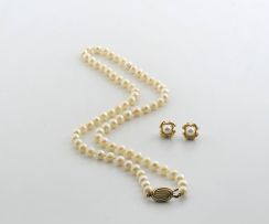 A cultured pearl necklace and a pair of earrings