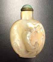 A Chinese mother-of-pearl snuff bottle, Qing Dynasty, 19th century