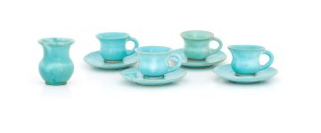 Four Linn ware turquoise-glazed coffee cups and saucers