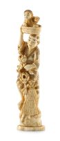 A Japanese ivory carving of a basket maker and his child, Meiji period (1868-1912)