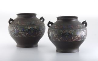 A pair of Japanese bronze and champlevé two-handled vessels, Meiji Period (1868-1912)