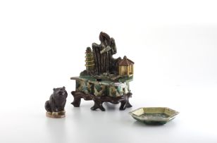 A Chinese Sancai glazed water dropper in the form of a grotto, Qing Dynasty, 17th century