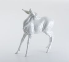 A Meissen white-glazed figure of a fawn deer, 20th century