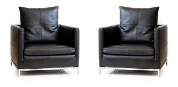 A pair of Italian black leather armchairs, modern