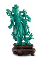 A Chinese carved turquoise figure of an Immortal, first half 20th century