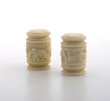 A pair of Indian carved ivory salt and pepper shakers, early 20th century
