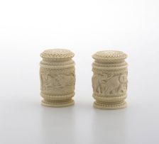 A pair of Indian carved ivory salt and pepper shakers, early 20th century