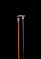 A Chinese silver-mounted ebonized walking stick, late 19th/early20th century