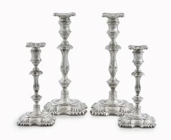 A set of four George V silver candlesticks, William Hutton & Sons Ltd, Sheffield, 1929