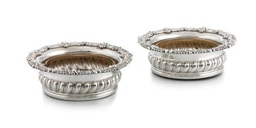 A pair of silver-plated wine coasters, 19th century