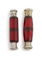 A Victorian silver-gilt and enamel mounted ruby-glass double-end scent bottle, maker's initials 'HF', London, 1859