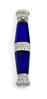 A Victorian gilt-metal-mounted novelty 'binocular' blue-glass double-end scent bottle