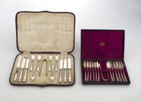 A cased set of twelve Scottish silver teaspoons and a pair of sugar tongs, David Taylor, Glasgow, 1885-1886, retailed by Daniel Todd