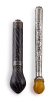 A silver-plated and black enamel parasol handle