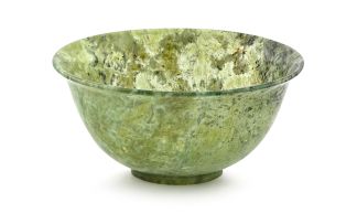 A Chinese spinach green jade bowl, first half 20th century