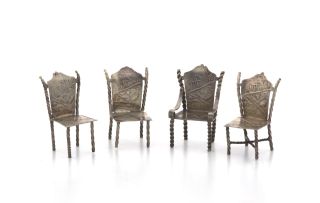 Three Dutch silver miniature side chairs and an armchair, .833 standard
