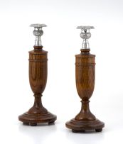 A pair of oak and silvered-metal-mounted candlesticks, modern