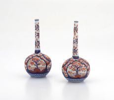 A pair of Japanese Imari bottle vases, late Meiji period (1868-1912)