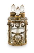 A German silver-gilt and glass-mounted dressing table decanter set, Wertheimer, with import marks for J G Piddington, London, 1906