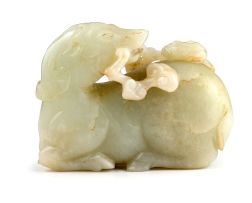 A Chinese carved pale green jade deer, Qing Dynasty