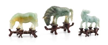 Three Chinese carved jade horses, late 19th/early 20th century