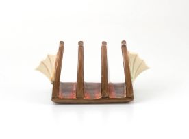 A Clarice Cliff earthenware toast rack, 1938-1945