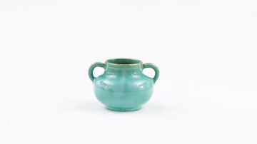 A Linn Ware pale-blue-glazed two-handled vase