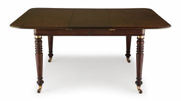A mahogany and brass-mounted extending campaign table