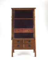 A Chinese provincial fruitwood cupboard, late 19th century