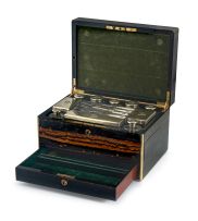 A Victorian silver-gilt-mounted travelling dressing-table set, James Vickery, Wells & Lambe, London, 1866