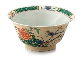 A Chinese famille-verte cafe-au-lait ground bowl, Qing Dynasty, 18th century