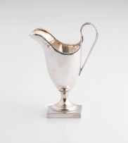 A George V silver cream jug, maker’s marks worn, Birmingham, 1919