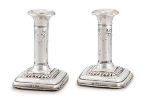 A pair of Edward VII silver candlesticks, Ellis Jacob Greenberg, Birmingham, 1908