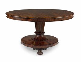 An early Victorian rosewood circular tilt-top loo table