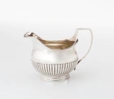 A George III silver milk jug, Robert Hennell I & David Hennell II, London, 1803