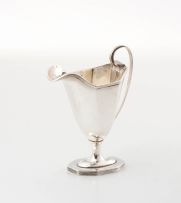 An Edward VII silver milk jug, Thomas Bradbury & Sons Ltd, Sheffield, 1908