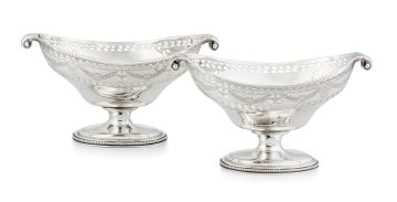 A pair of Edward VII silver pedestal dishes, CS Harris & Sons Ltd, London, 1908