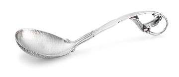 A Georg Jensen silver ladle (1910-1925), import marks for London, George Stockwell & Co Ltd, 1929, .925 sterling
