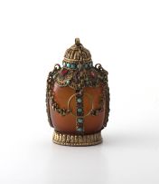 A Mongolian jewelled and gilt-metal-mounted amber snuff bottle, late 19th/early 20th century