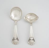 A Danish silver sauce ladle and serving spoon, Johannes Siggaard, Carl M. Cohr, Copenhagen, 1933