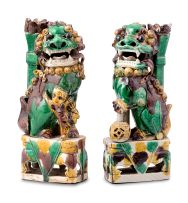 A pair of Chinese sancai-glazed Dogs of Fo incense holders, Qing Dynasty, 18th century
