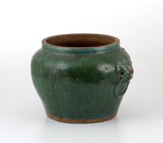 A Chinese green-glaze stoneware jar, 18th/19th century