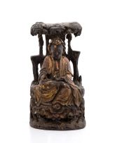 A Chinese carved wood figure of Guanyin, late 18th/early 19th century