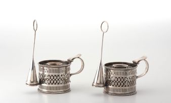 A pair of silver-plate candleholders and snuffers, Goldsmiths Co, late 19th/early 20th century
