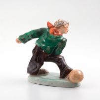 A Wedgwood & Co earthenware figure playing soccer, circa 1908