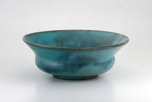 A Linn Ware viridian green-glazed bowl