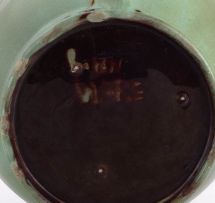 A Linn Ware green-glazed jug