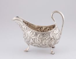 An Irish silver milk jug, Dublin, marks indistinct, 19th century