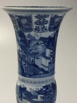 A pair of Chinese blue and white Gu vases, Qing Dynasty, Kangxi (1662-1722)